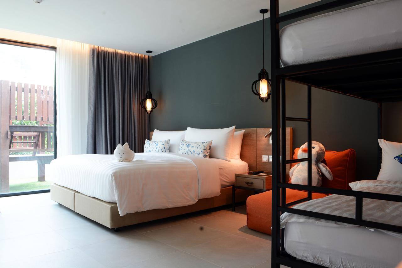 Fusion Suites Phuket Patong Buitenkant foto Family room at The Base