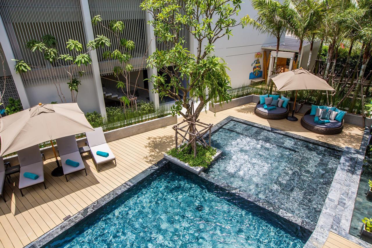 Fusion Suites Phuket Patong Buitenkant foto The swimming pool at the hotel