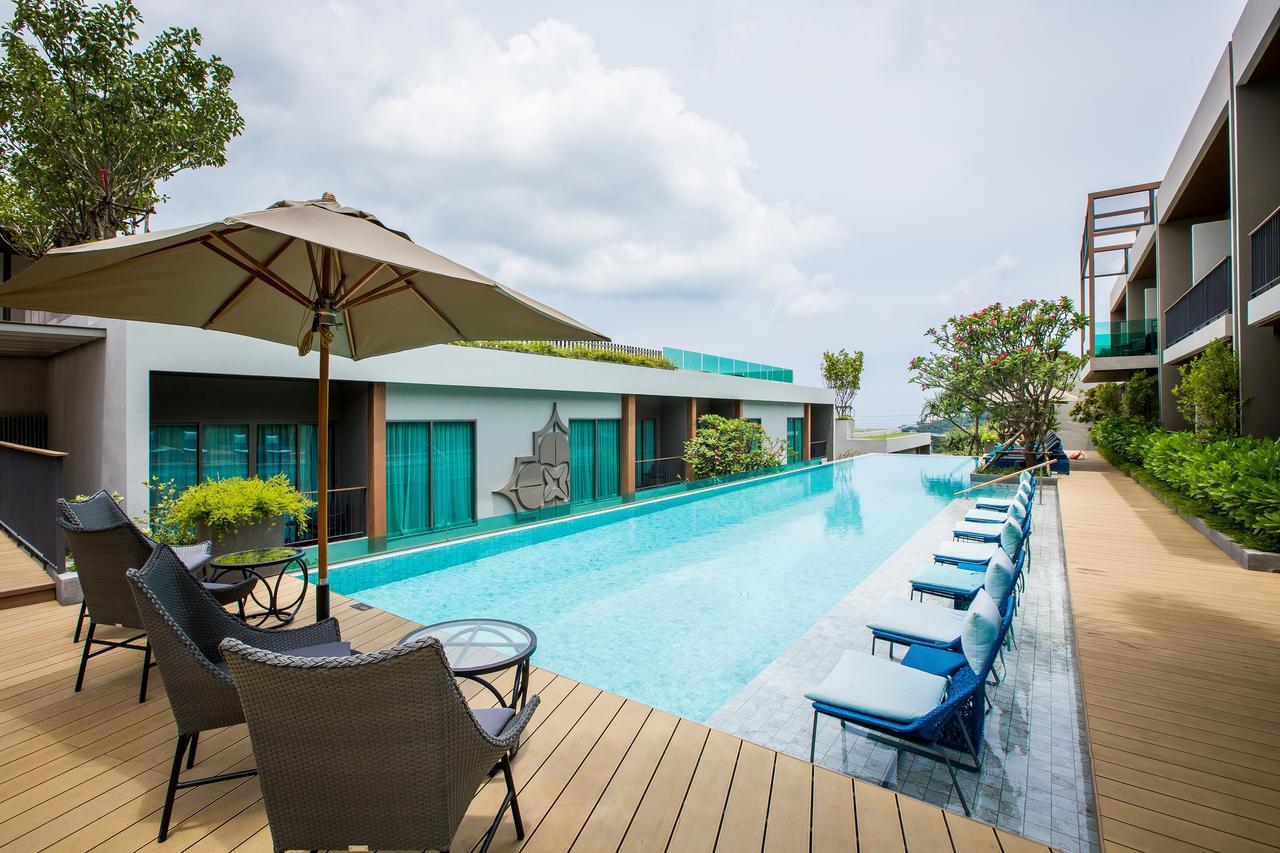 Fusion Suites Phuket Patong Buitenkant foto The swimming pool at the hotel